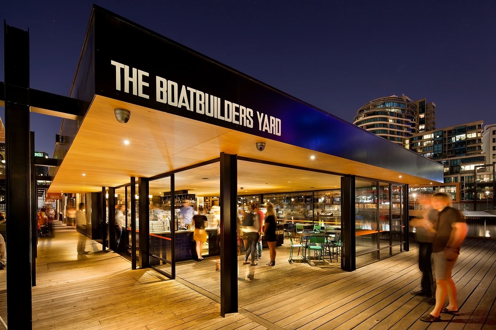 People dining at the Boatbuilders Yard by Greg Elms