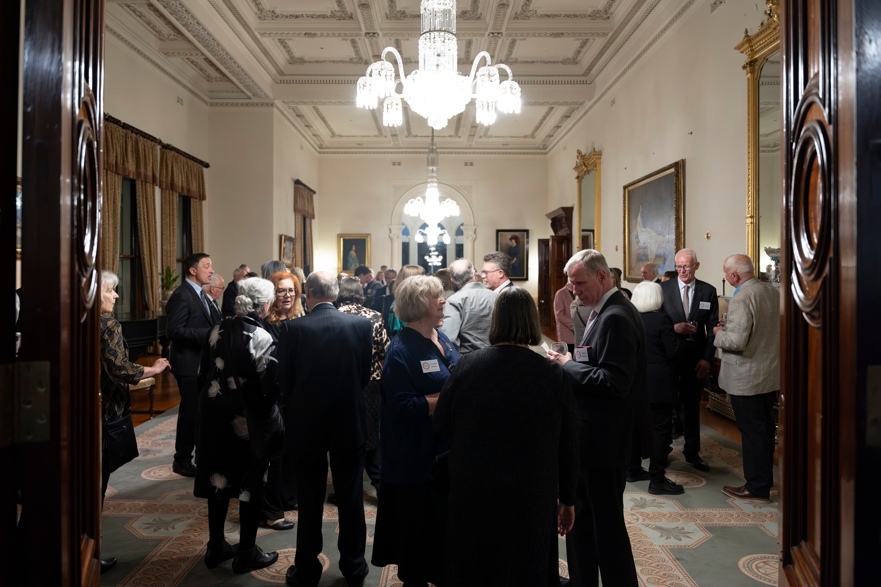 Guests talking at the event